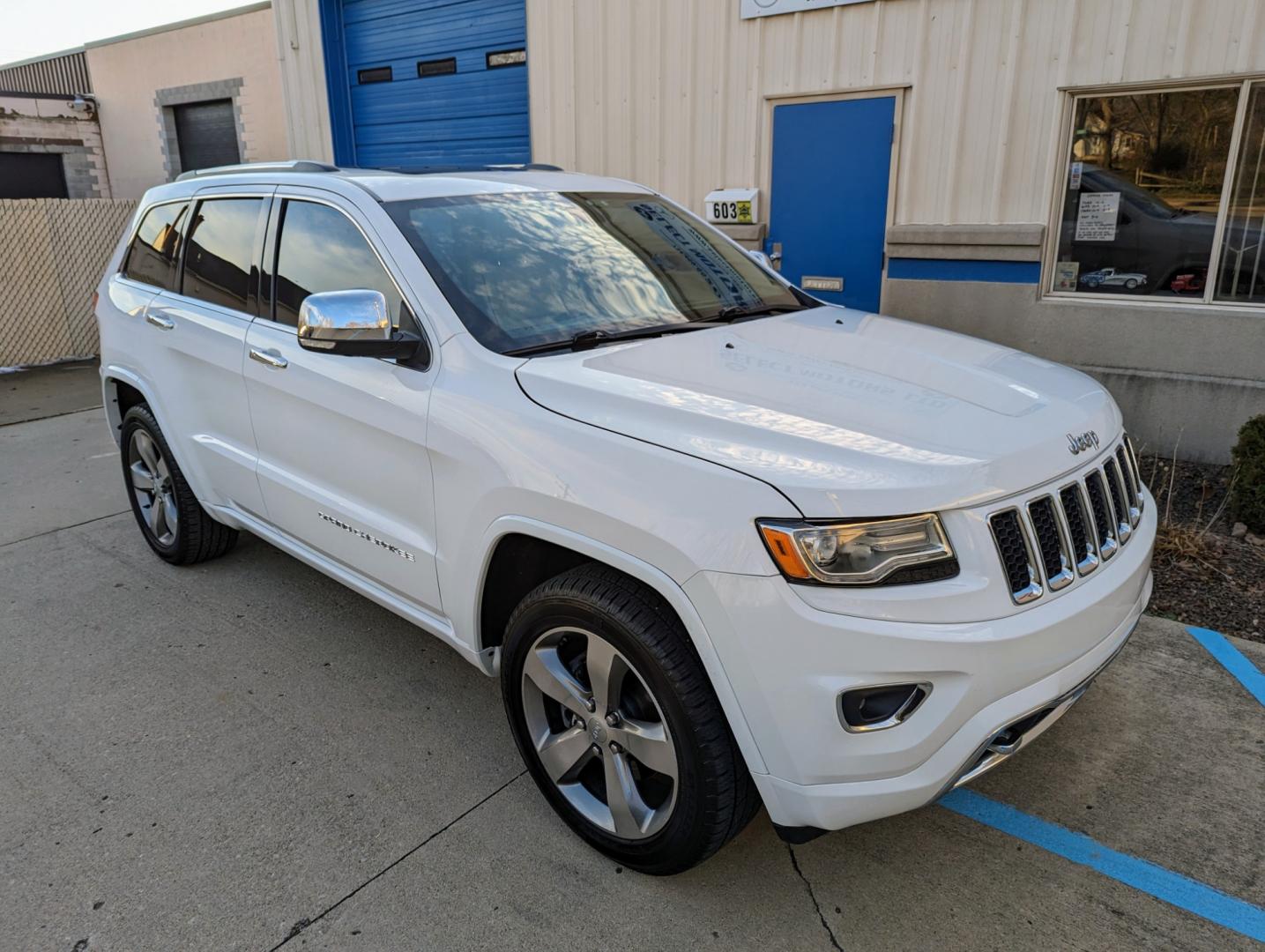 2014 White /Nepal Tan Jeep Grand Cherokee (1C4RJFCGXEC) with an 3.6L V6 DOHC 24V engine, Automatic transmission, located at 603 Amelia Street, Plymouth, MI, 48170, (734) 459-5520, 42.378841, -83.464546 - Vehicles shown by appointment - Please call ahead - 734-459-5520, text 734-658-4573 or contact us via our web site at: http://www.selectmotors.com for complete Inventory, Photos, Videos and FREE Carfax Reports. 2014 Jeep Grand Cherokee Overland, Bright White/Nepal Tan interior, 116K miles, all wh - Photo#11